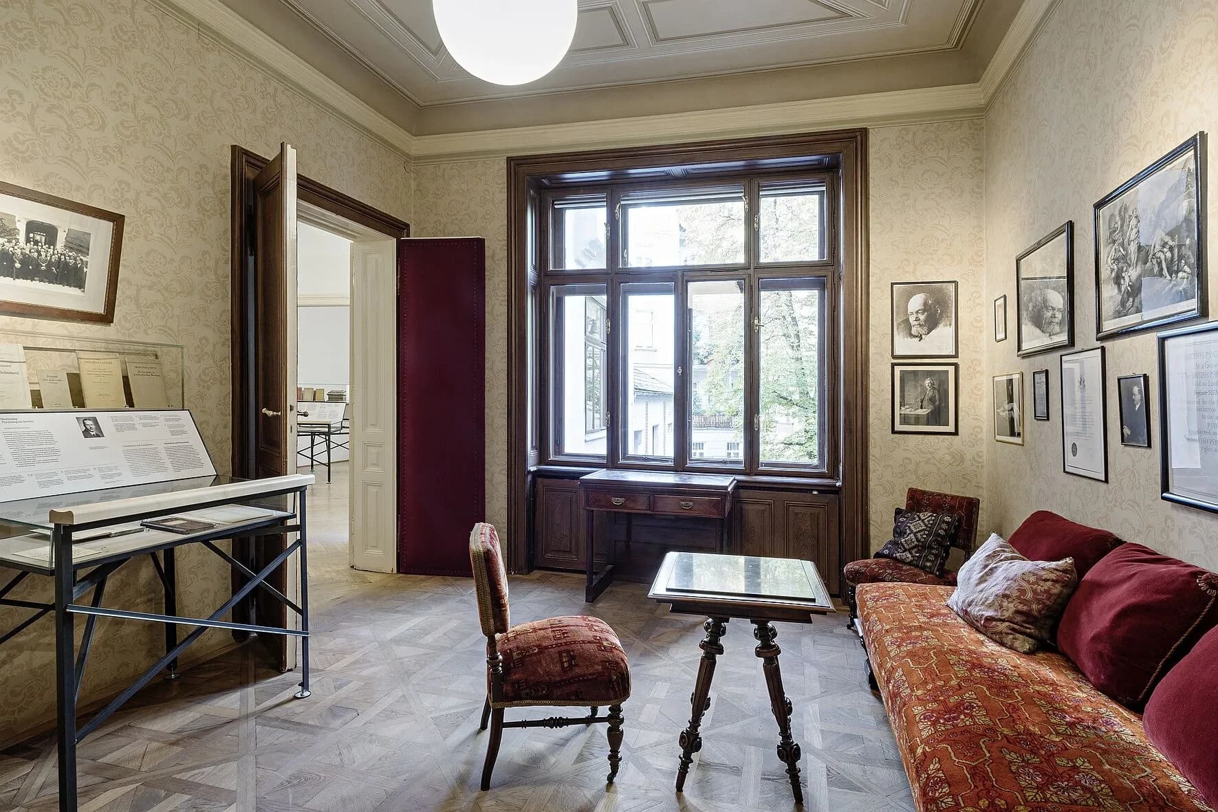 Historic room with framed artwork, part of Vienna's cultural sights near Hotel Boltzmann